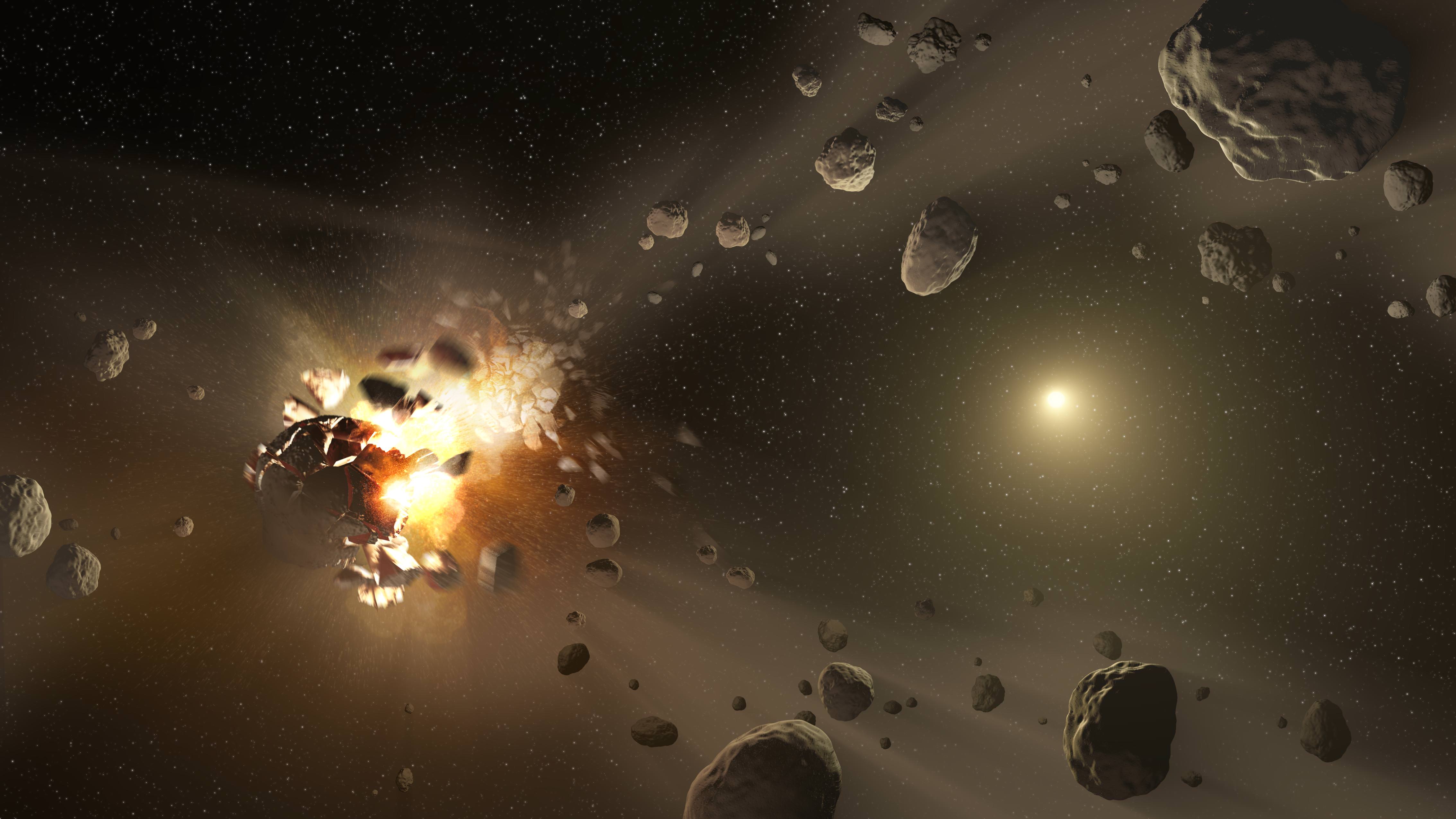 An artist's conception of an asteroid collision, which leads to how "families" of these space rocks are made in the belt between Mars and Jupiter. Credit: NASA/JPL-Caltech