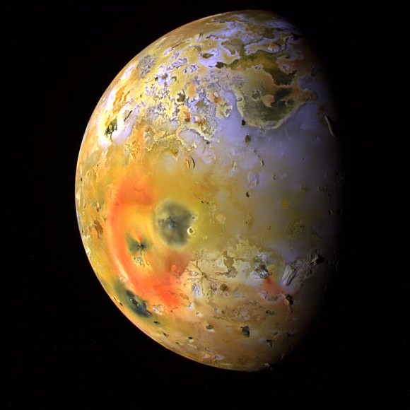 Io, a moon of Jupiter.  The colors in this image have been enhanced to better show differences. Sulfur dioxide frost appears in white and grey, and other types of sulfur are in yellow and brown. Recent volcanic activity is marked by red and black blotches. Credit: NASA