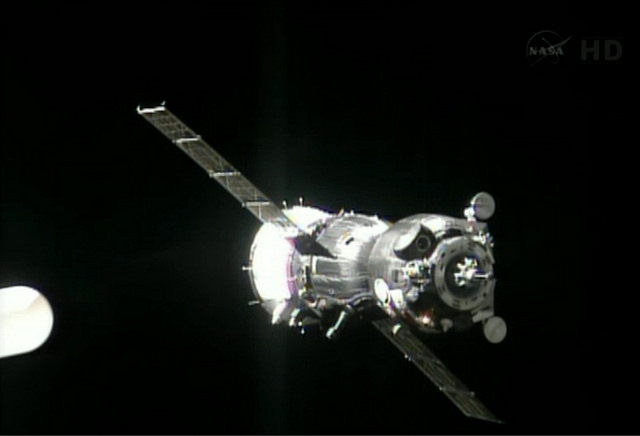 Screenshot from NASA TV of the Soyuz TMA-09M spacecraft arriving at the International Space Station. 