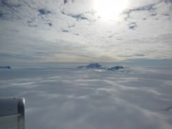 Only the tips of many of Antarctica's mountains are visible above thousands of feet of ice. (Oct. 2012 IceBridge photo. Credit: NASA / Christy Hansen)