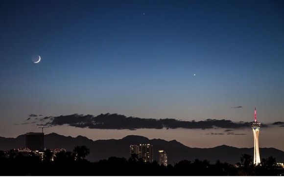 The crescent Moon forms a triangle with Venus and Mercury. Taken near Las Vegas on June 10, 2013. Credit and copyright: John Lybrand. 