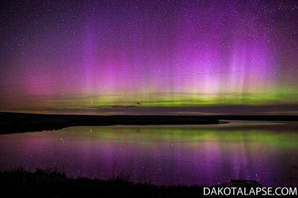 Mirrored Aurora - Aurora mirrors off a small lake in central South Dakota on June 6, 2013. Credit and copyright: Randy Halverson/Dakotalapse.