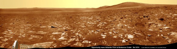 Opportunity rover’s view very near the foothills of Solander Point along the rim and vast expanse of Endeavour Crater.  Solander Point is the 1st Martian Mountain NASA’s Opportunity will climb and the rovers next destination. Solander Point may harbor clay minerals indicative of a past Martian habitable environment. This navcam panoramic mosaic was assembled from raw images taken on Sol 3374 (July 21, 2013).  Credit: NASA/JPL/Cornell/Marco Di Lorenzo/Ken Kremer (kenkremer.com)