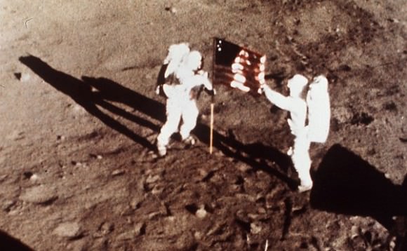 Neil Armstrong and Buzz Aldrin plant the US flag on the Lunar Surface during 1st human moonwalk in history 45 years ago on July 20, 1969 during Apollo 1l mission. Credit: NASA
