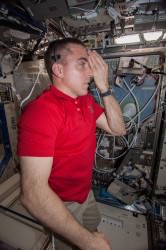 Chris Cassidy, an Expedition 36 flight engineer, tests his eyesight aboard the International Space Station. Credit: NASA