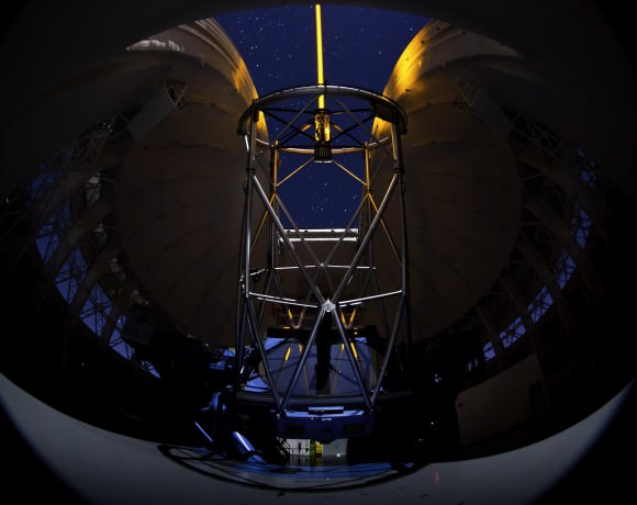 The Gemini South telescope during laser operations with GeMS/GSAOI. Credit: Manuel Paredes