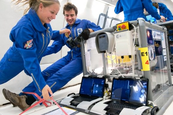 Naomi Murdoch and Thomas-Louis de Lophem in zero gravity alongside the AstEx experiment. Credit: A. Le Floc’h, ESA