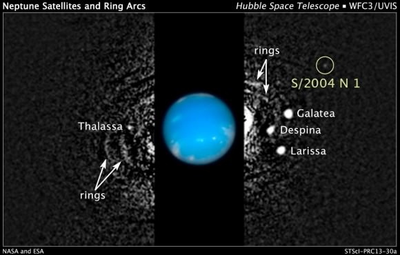 This composite Hubble Space Telescope picture shows the location of a newly discovered moon, designated S/2004 N 1, orbiting the giant planet Neptune, nearly 4.8 billion km (3 billion miles) from Earth. Credit: NASA, ESA, and M. Showalter (SETI Institute).