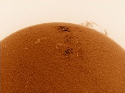 The Sun, with AR1800 on July 28, 2013. This sunspot poses a slim threat for M-class flares the next few days, NASA says. Credit and copyright: César Cantú. 