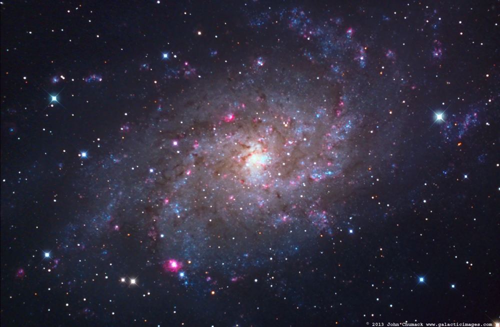 M33, the Triangulum Spiral Galaxy, seen here in a 4.3 hour exposure image. Astronomers used JWST to examine a section of its south spiral arm to search out and find nearly 800 newly forming stars. Credit and copyright: John Chumack.