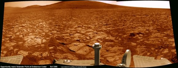 Opportunity rover’s 1st mountain climbing goal is dead ahead in this up close view of Solander Point along the eroded rim of Endeavour Crater.  Opportunity will soon ascend the mountain in search of minerals signatures indicative of a past Martian habitable environment.  This navcam panoramic mosaic was assembled from raw images taken on Sol 3385 (Aug 2, 2013).  Credit: NASA/JPL/Cornell/Marco Di Lorenzo/Ken Kremer (kenkremer.com)