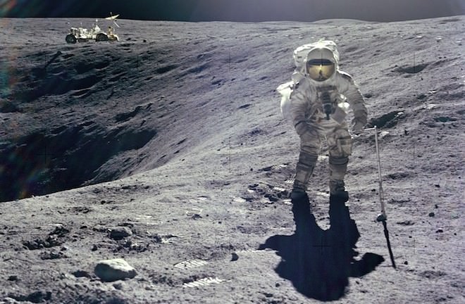 Astronaut Charles Duke collecting samples during Apollo 16. Credit: NASA.