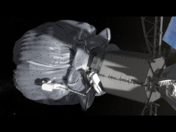 In this conceptual image, the two-person crew uses a translation boom to travel from the Orion spacecraft to the captured asteroid during a spacewalk. Credit: NASA.