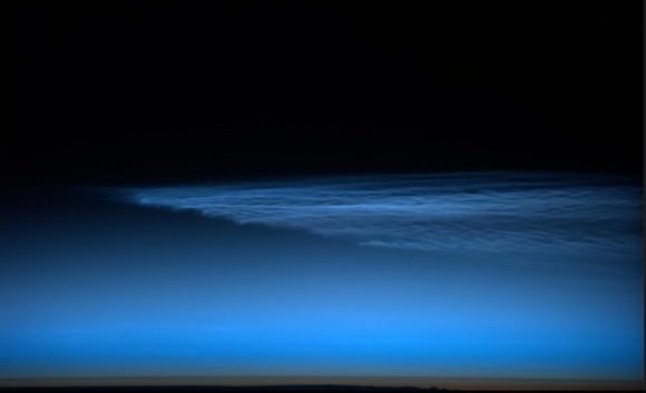 Bright blue noctilucent clouds seen on July 28, 2013. Credit: NASA/ISI/ESA, via Luca Parmitano on Twitter. 