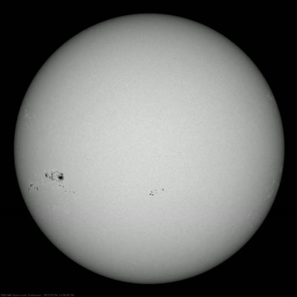 A massive sunspot group that rotated into view in early July, 2013... one of the largest seen for solar cycle #24 thus far. (Credit: NASA/SDO). 