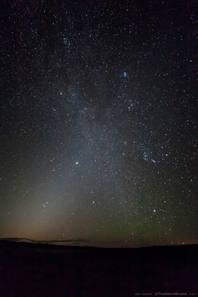 The clash of the zodiacal light and the plane of our galaxy. (Credit: Cory Schmitz, used with permission).