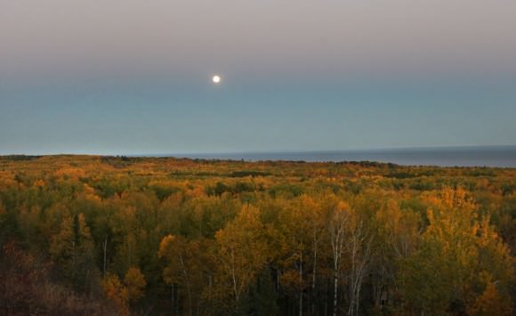 The Harvest Moon rises over Lake Superior in Duluth, Minn. When you’re out enjoying this year’s full moon on Wednesday and Thursday nights, watch for the dark band you see in the photo. That’s the Earth’s shadow. It’s visible for about 15-20 after sunset and topped by the pink-tinged Belt of Venus, where the atmosphere is still reflecting reddened sunlight. Credit: Bob King