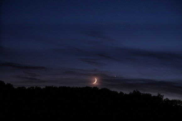 The new Moon with Venus on its right. Taken from the dark sky preserve at the Nutwood Observatory in central Ontario, Cananda. Credit and copyright:  Brian McGaffney.