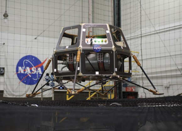 The Modular Common Spacecraft Bus lander configuration in a hover test in 2008. The lander could be used to deploy micro-rovers. Credit: NASA