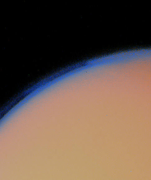 Saturn's moon Titan lies under a thick blanket of orange haze in this Voyager 1 picture. Credit: NASA