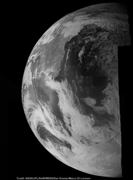 NASA's Juno probe captured the image data for this composite picture during its Earth flyby on Oct. 9 over Argentina,  South America and the southern Atlantic Ocean. Raw imagery was stitched by Ken Kremer and Marco Di Lorenzo in this view taken by a near-infrared filter that is typically used to detect methane. Credit: NASA/JPL/SwRI/MSSS/Ken Kremer/Marco Di Lorenzo