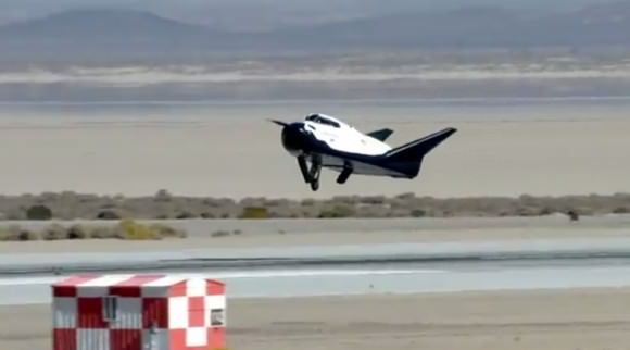 Left landing gear failed to deploy as private Dream Chaser spaceplane approaches runway at Edwards Air Force Base, Ca. during first free flight landing test on Oct. 26, 2013 - in this screenshot.   Credit: Sierra Nevada Corp.  