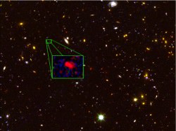 Galaxy z8_GND_5296 (seen in the inset) is the earliest galaxy that astronomers have measured the distance to accurately. It formed approximately 700 million years after the Big Bang, and is forming stars at an incredibly rapid rate. [Credit: V. Tilvi (Texas A&M), S. Finkelstein (UT Austin), the CANDELS team, and HST/NASA]