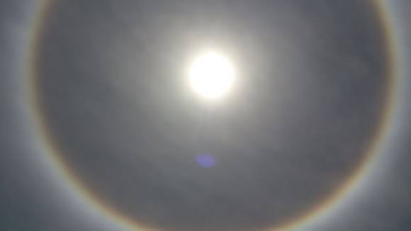 Image of a Sun halo seen over Botswana, Southern Africa at 11:08 am local time on Nov, 6, 2013. Taken with an iPhone. Credit: Belleminah K Chitonho.