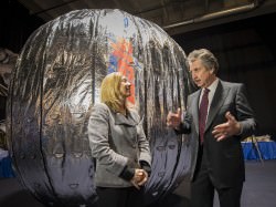 Space station construction is still ongoing. In 2015, the Bigelow Expandable Activity Module (BEAM) will be attached to the station as a sort of inflatable room. The test will examine the viability of inflatable structures in space. Pictured in front are NASA Deputy Administrator Lori Garver and Robert T. Bigelow, president and founder of Bigelow Aerospace in 2013. NASA/Bill Ingalls