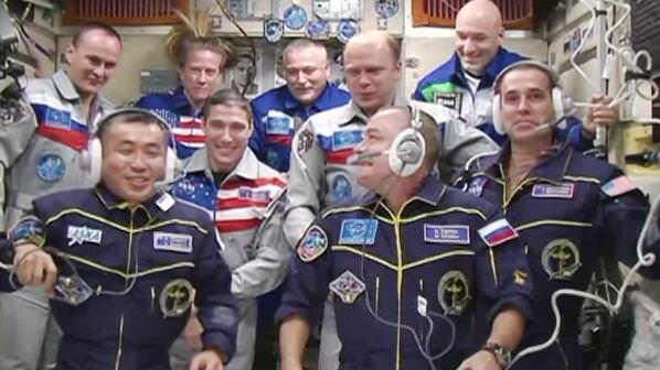 Nine crew members together on the International Space Station. The Expedition 38 crew entered the ISS at 12:44 UTC (7:44 am EST). The crew of nine will work together till Sunday. Credit: NASA