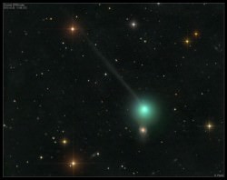 Comet 2P/Encke on October 30, 2013. The coma is partially obscuring the small barred spiral galaxy NGC 4371. Credit and copyright: Damian Peach. 