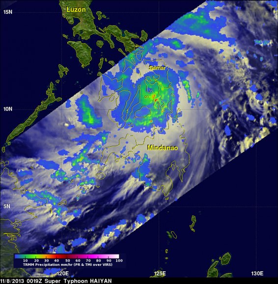 NASA's TRMM satellite data on Nov. 8 at 00:19 UTC showed Haiyan had a well-defined eye surrounded by a symmetric area of moderate rain (green ring with a blue center) with several rainbands wrapping in from the south (green arcs) while crossing the island of Leyte in the central Philippines.  Credit:  NASA/SSAI, Hal Pierce 