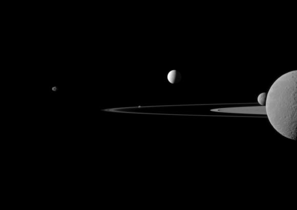 Saturn's moons (from left to right) Janus, Pandora, Enceladus, Mimas and Rhea. Rhea is on top of Saturn. Credit: NASA/JPL-Caltech/Space Science Institute