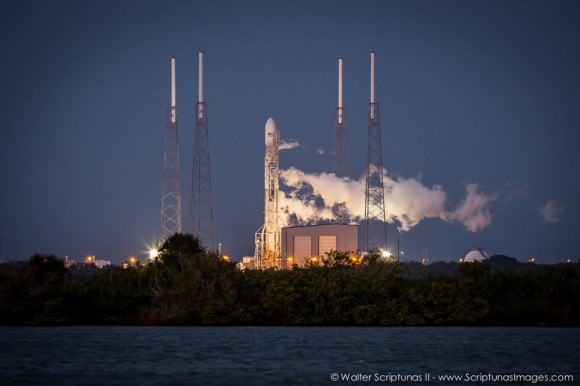 A SpaceX Falcon 9 V1.1 rocket vents oxygen following Thursday evenings first launch attempt from Launch Complex 40 at Cape Canaveral Air Force Station. The first attempt was halted after computers showed that the engines had a slower than expected thrust rate upon startup. Credit: Walter Scriptunas II images
