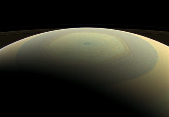 Saturn makes a beautifully striped ornament in this natural-color image, showing its north polar hexagon and central vortex (Credit: NASA/JPL-Caltech/Space Science Institute)