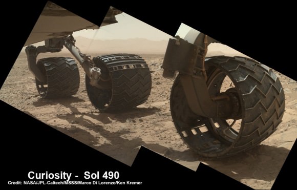 Photomosaic shows new holes and tears in several of rover Curiosity’s six wheels caused by recent driving over sharp edged Martian rocks on the months long trek to Mount Sharp. Raw images taken by the MAHLI camera on Curiosity’s arm on Dec. 22, 2013 (Sol 490) were assembled to show some recent damage to several of its six wheels – most noticeably the two here in middle and front. Credit: NASA / JPL / MSSS / Marco Di Lorenzo / Ken Kremer- kenkremer.com See below complete 6 wheel mosaic and further wheel mosaics for comparison 
