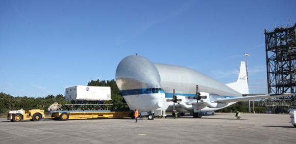 Orion EFT-1 heat shield moved off from NASA’s Super Guppy aircraft after arrival at the Kennedy Space Center in Florida on Dec. 5, 2013. Credit: Ken Kremer/kenkremer.com