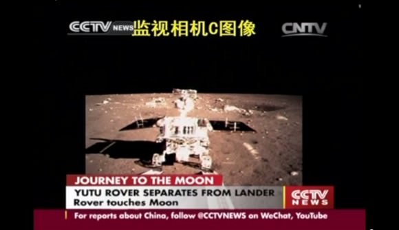 China's first lunar rover separates from Chang'e-3 moon lander early Dec. 15, 2013. Screenshot taken from the screen of the Beijing Aerospace Control Center in Beijing. Credit: CCTV