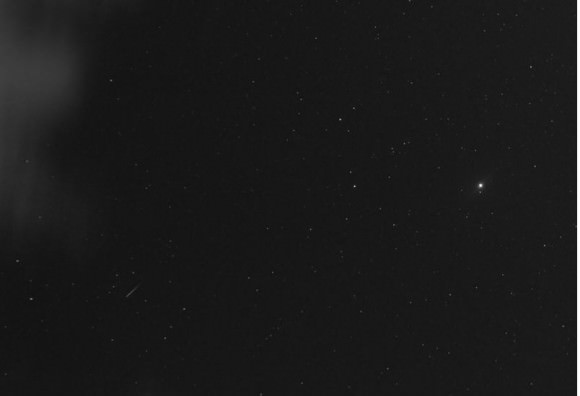 A Geminid meteor races away from Jupiter on Dec. 14, 2013. Credit and copyright: James Lennie. 