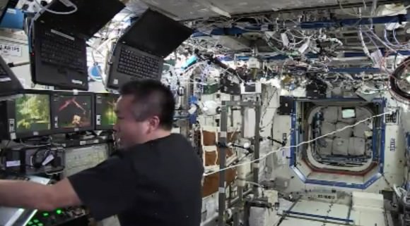 Japanese astronaut Koichi Wakata controlled Canadarm2 during two spacewalks to replace a faulty ammonia pump in December 2013. Credit: NASA TV (screenshot)