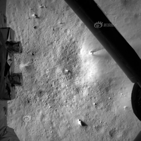 Photo taken by the descent imaging camera on Dec. 14, 2013 shows lunar landscape during Chang'e-3 lunar probe's landing at an altitude of 7.9 kilometers.  Credit: Chinese Academy of Sciences