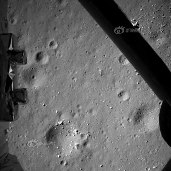 Photo taken by the descent imaging camera on Dec. 14, 2013 shows lunar landscape during Chang'e-3 lunar probe's landing at an altitude of 99 meters.  Credit: Chinese Academy of Sciences
