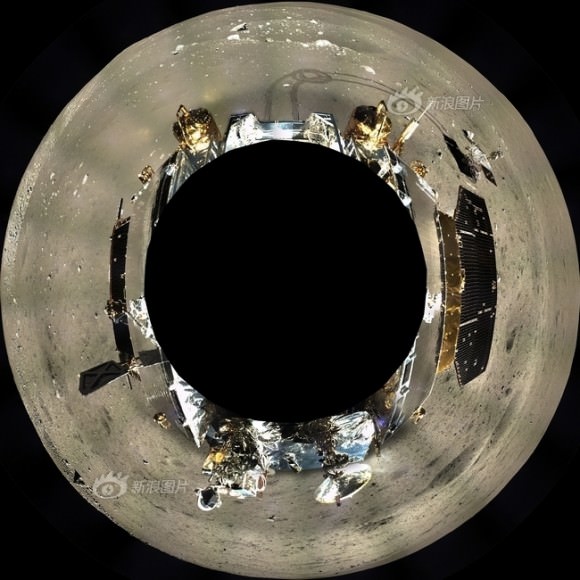 This digitally-combined polar panorama shows a 360 degree color view of the moonscape around the Chang’e-3 lander after the Yutu moon rover drove onto the lunar surface leaving visible tracks behind.  Images were taken from Dec. 17 to Dec. 18, 2013.  Credit: Chinese Academy of Sciences