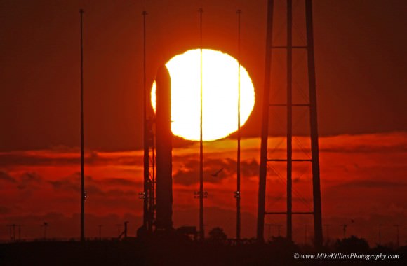 Gorgeous Wallops Sunrise greets Antares rocket poised at Launch Pad 0A on Virginia shoreline.  A blast of solar radiation on Jan. 7 postponed Antares blastoff from Jan 8 to Jan 9, 2014. Credit: Mike Killian/mikekillianphotography.com