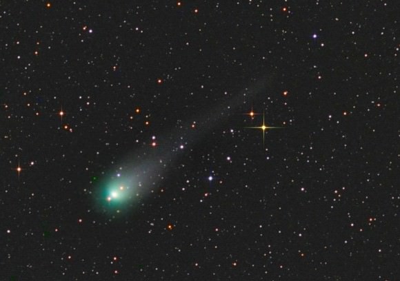 Comet C/2012 X1 LINEAR shows a green coma from fluorescing gases and a short tail in this photo made on Jan. 15, 2014. Credit: Rolando Ligustri