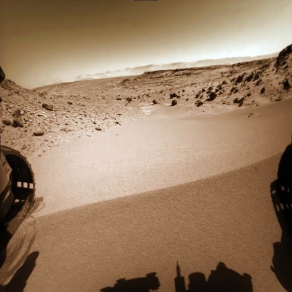 Curiosity does a “toe dip” wheel motion test at Dingo Gap sand dune on Sol 534, Feb 5, 2014 before crossing dune on Sol 535. Hazcam image linearized and colorized. Credit: NASA/JPL/Marco Di Lorenzo/Ken Kremer- kenkremer.com  