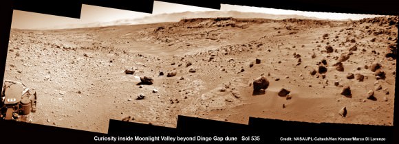 Curiosity scans Moonlight Valley beyond Dingo Gap Dune. Curiosity’s view to “Moonlight Valley” beyond after crossing over ‘Dingo Gap’ sand dune. This photomosaic was taken after Curiosity drove over the 1 meter tall Dingo Gap sand dune and shows dramatic scenery in the valley beyond, back dropped by eroded rim of Gale Crater. Assembled from navigation camera (navcam) raw images from Sol 535 (Feb. 6, 2104) Credit: NASA/JPL-Caltech/Ken Kremer- kenkremer.com/Marco Di Lorenzo