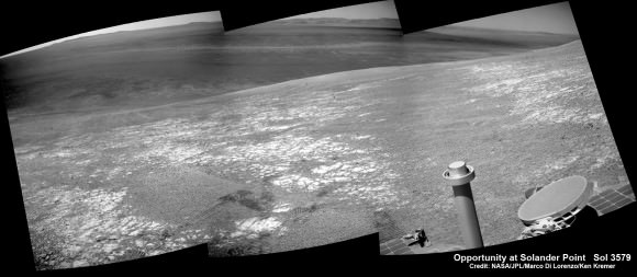 NASA’s Opportunity rover was imaged here from Mars orbit by MRO HiRISE camera on Feb. 14, 2014.  This mosaic shows Opportunity’s view today while looking back to vast Endeavour crater from atop Murray Ridge by summit of Solander Point.  Opportunity captured this photomosaic view on Feb. 16, 2014 (Sol 3579) from the western rim of Endeavour Crater where she is investigating outcrops of potential clay minerals formed in liquid water.  Assembled from Sol 3579 navcam raw images.  Credit: NASA/JPL/Cornell/Marco Di Lorenzo/Ken Kremer-kenkremer.com