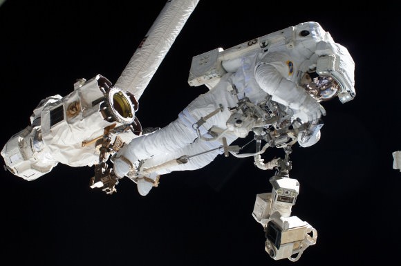 European Space Agency astronaut Luca Parmitano on a spacewalk July 9, 2016 during Expedition 36. Here, Parmitano is riding the end of the robotic Canadarm2. Credit: NASA