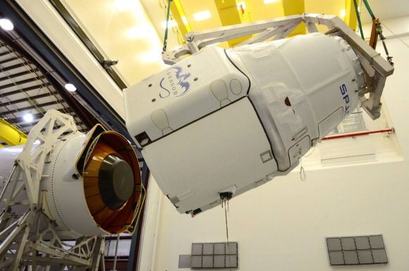 The Dragon spacecraft, filled with about 4,600 lbs of cargo bound for the space station, is mated with Falcon 9.  Credit: SpaceX